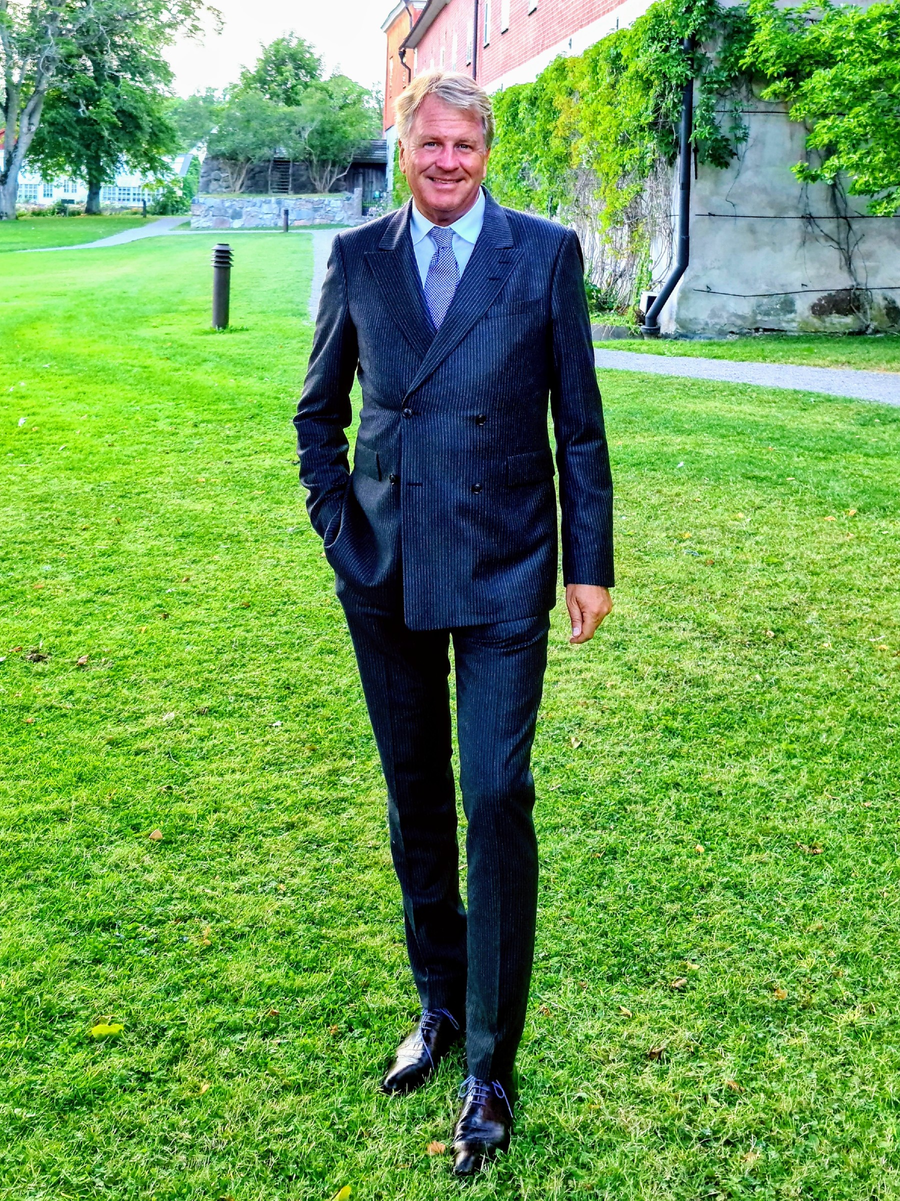 Lars Carlstrom standing on the lawn at Gripsholm