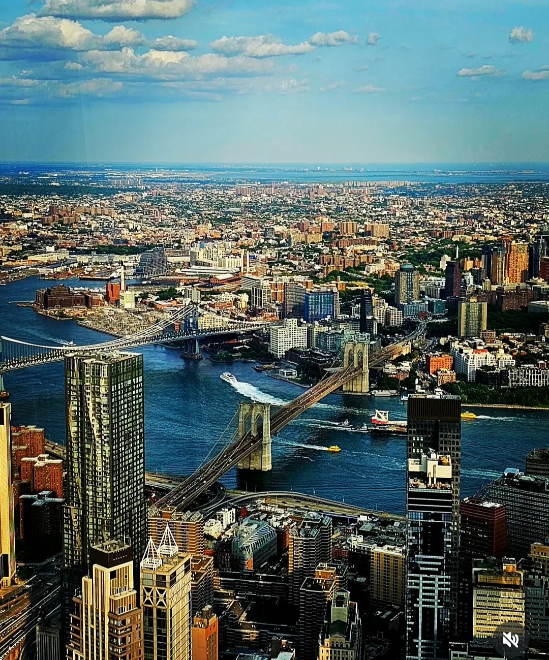 Aerial view of Brooklyn Bridge and Manhattan Bridge across the East River